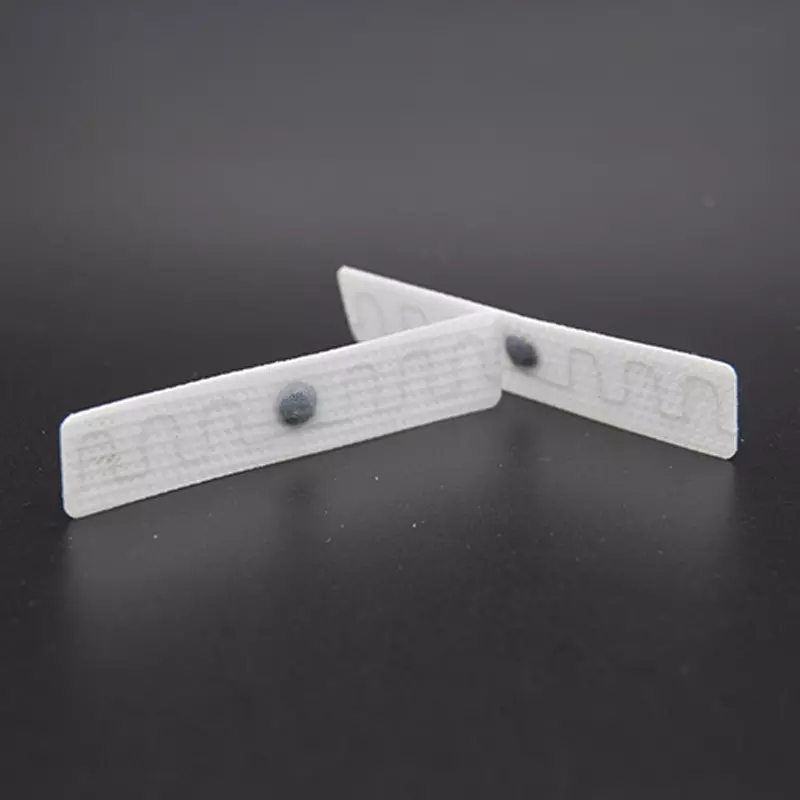 Étiquette de blanchisserie intelligente RFID en tissu flexible pour la gestion des stocks