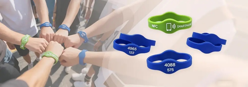 Person using dual frequency RFID silicone wristband for secure access control