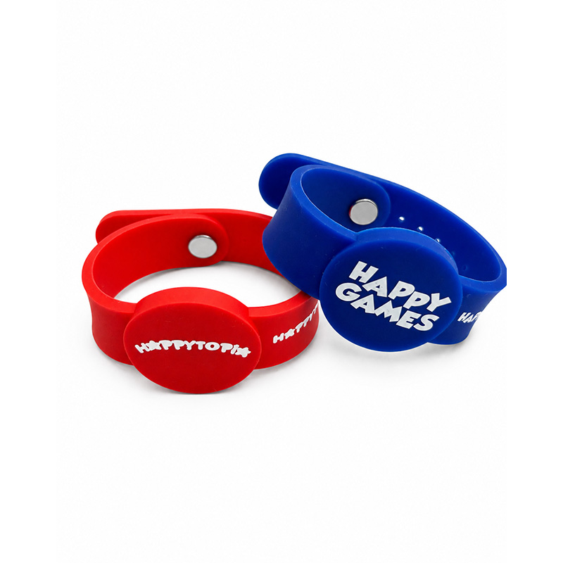 Child wearing blue RFID silicone wristband for amusement park access control and visitor identification