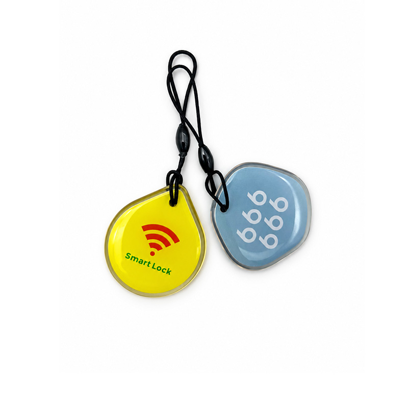 Side view of epoxy key tags showing the transparent sealed edge